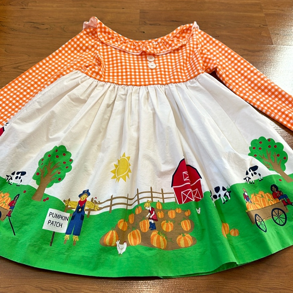Girls long sleeve fall themed dress size 6-7.